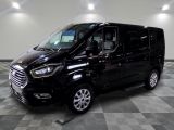 an image of a black van parked in a garage