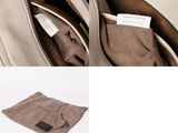 two pictures of a bag with a label on it and a bag with a zipper