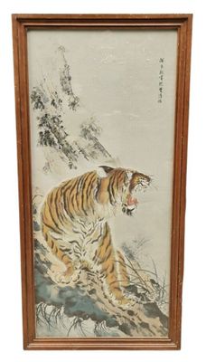 une image représentant un tableau représentant un tigre, dans un cadre en bois