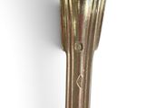 a silver spoon with a handle on a white background