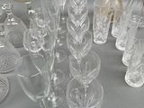 a lot of glass items that are on the table