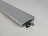 a close up of a silver aluminum profile on a white surface
