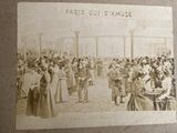 an old photo of a group of people standing in front of a building