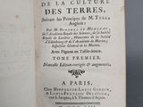an open book with a black and white title on it