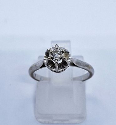 BAGUE en or gris 750 millièmes, sertie d'un brillant sur un …