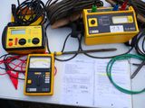 a table with a bunch of electrical equipment on top of it