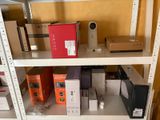 many boxes on the shelves in the room