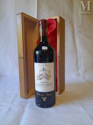 a bottle of wine in a wooden box on a table