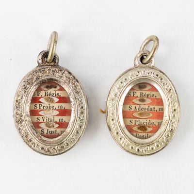 two silver lockes with a picture of a donut on them