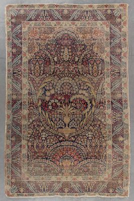 tapis persan ancien à motif floral sur fond bleu