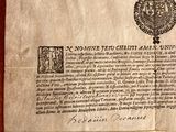 an old document with a picture of a coat of arms on it