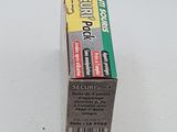 a box of toothpaste sitting on a white surface
