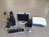 a lot of electronics that are sitting on the floor