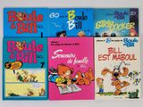 plusieurs livres pour enfants sont alignés sur une surface blanche