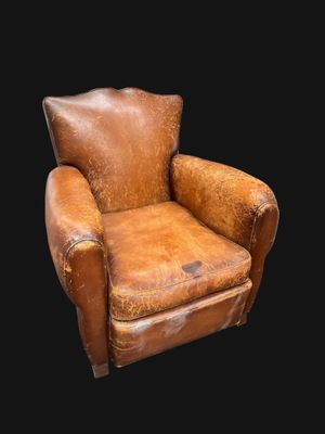 Fauteuil club en cuir camel, très frotté