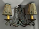 two lamps that are on the wall next to each other