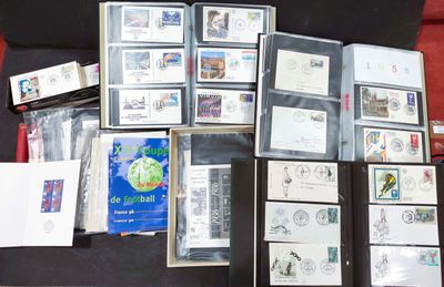 a lot of stamps and envelopes sitting on a table