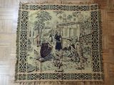 a tapestry on the floor of a room with a picture of a woman and two children