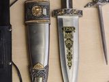 several different types of knives on a table