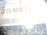 a sign that says essadot it on the side of a building