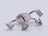 silver tone cuff ring with rhines and the word love on it