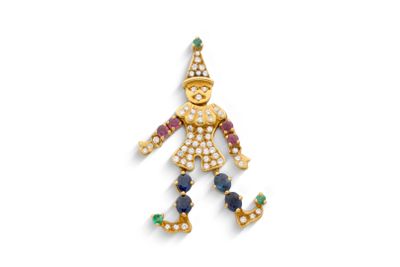 une broche en forme de clown en or et diamants, signée Van Cleef