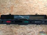 a black case with a pen and a pair of scissors in it