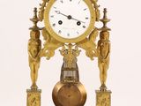 a clock that is sitting on top of a table