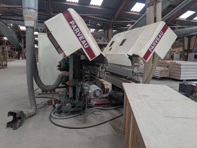two machines that are sitting in a building
