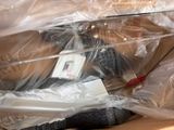a box with a pair of scissors and a pair of scissors in it