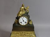 a clock that is sitting on top of a table