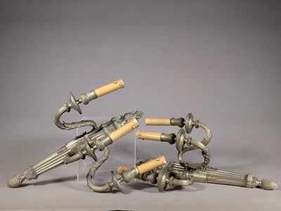 two guns that are sitting on top of each other