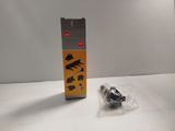 a small box with a black and yellow sticker on it