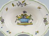 a bowl with a design on it on a table