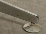a close up of a piece of metal on a table