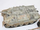 two toy tanks that are sitting next to each other