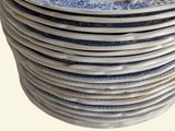 a lot of plates stacked on top of each other