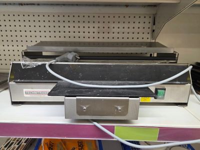 an image of a machine that is sitting on a shelf in a store