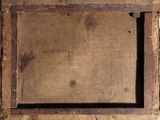 an old picture of a picture frame hanging on a wall