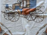 a scarf with a picture of a horse drawn carriage
