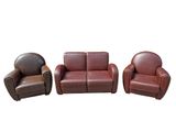 three pieces of leather furniture including a reclining chair and a reclining chair