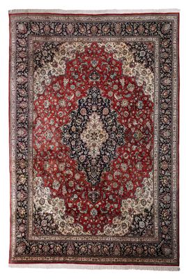 a red and black rug on a white background