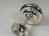 a silver object that is sitting on a table