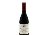 a bottle of wine that is sitting on a table