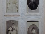 an old photo of a group of people in a picture frame