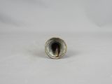 an image of a small metal pipe on a white surface