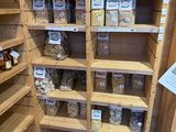 many shelves of food in the store that are ready to be bought