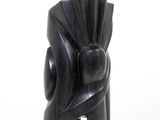 an image of a black sculpture on a white background