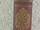 a red book that is sitting on a table