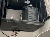 a fan that is sitting on top of a cabinet